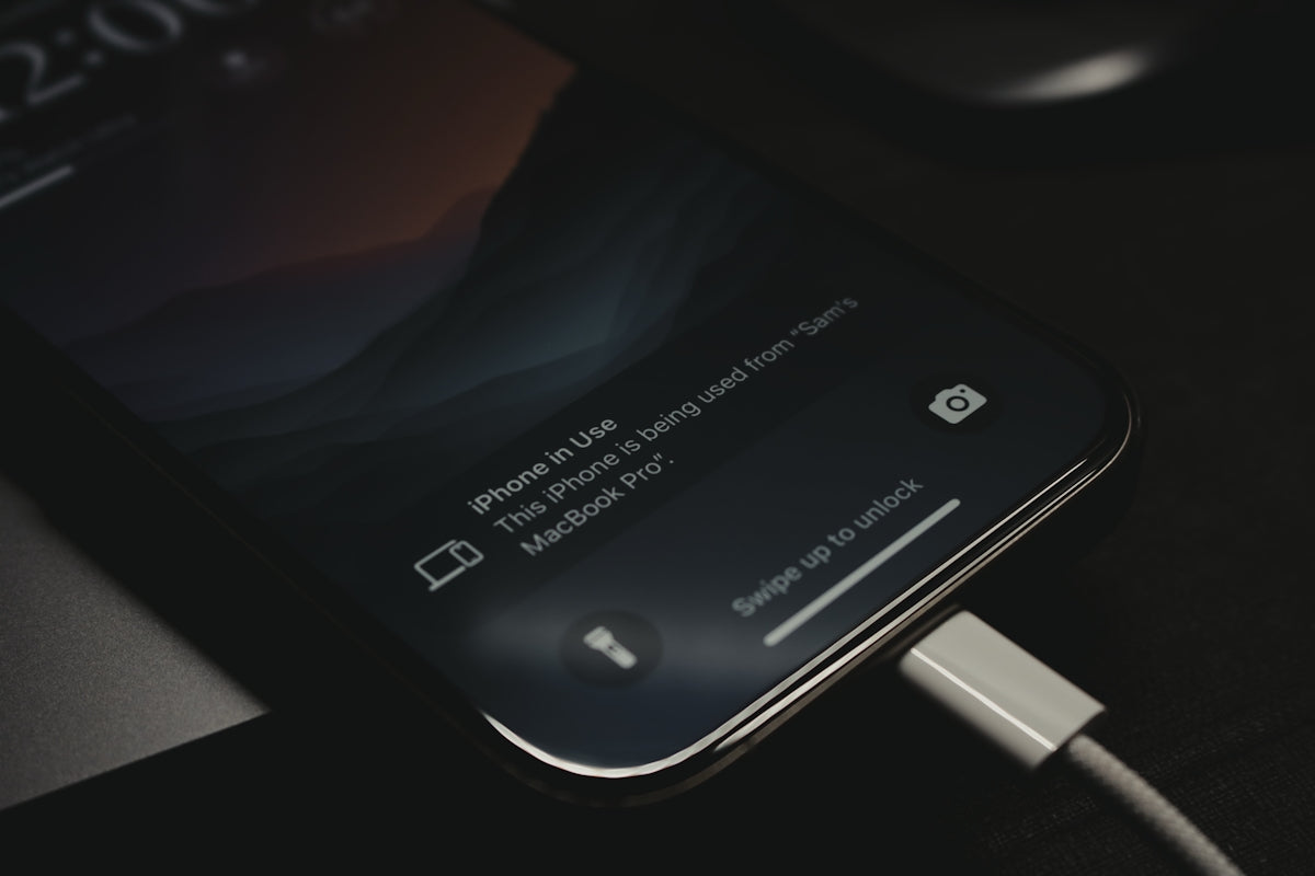 A close up of a cell phone charging