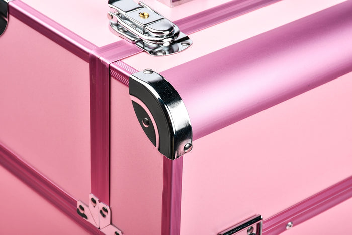 a close up of a pink suitcase on a white background