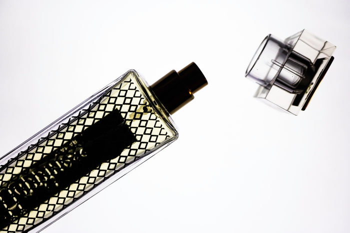 black and silver perfume bottle