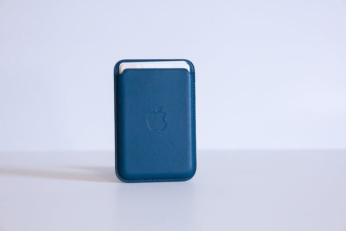 blue ipod touch on white surface