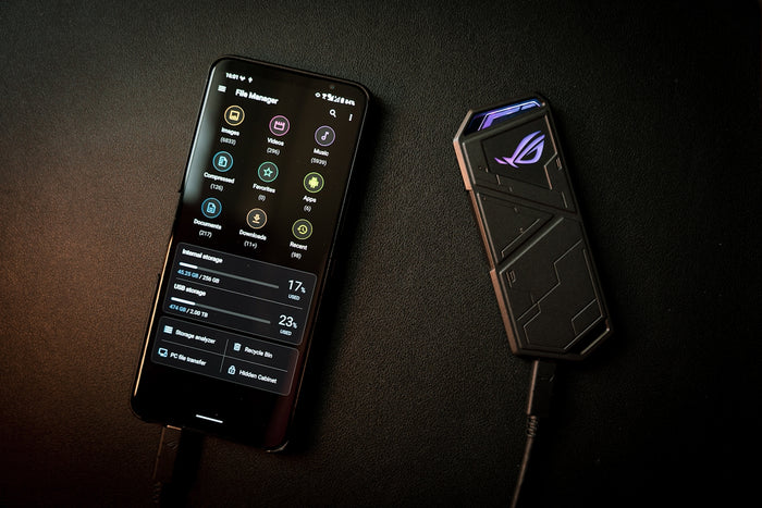 black remote control on black textile