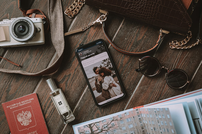 a cell phone sitting on top of a wooden floor