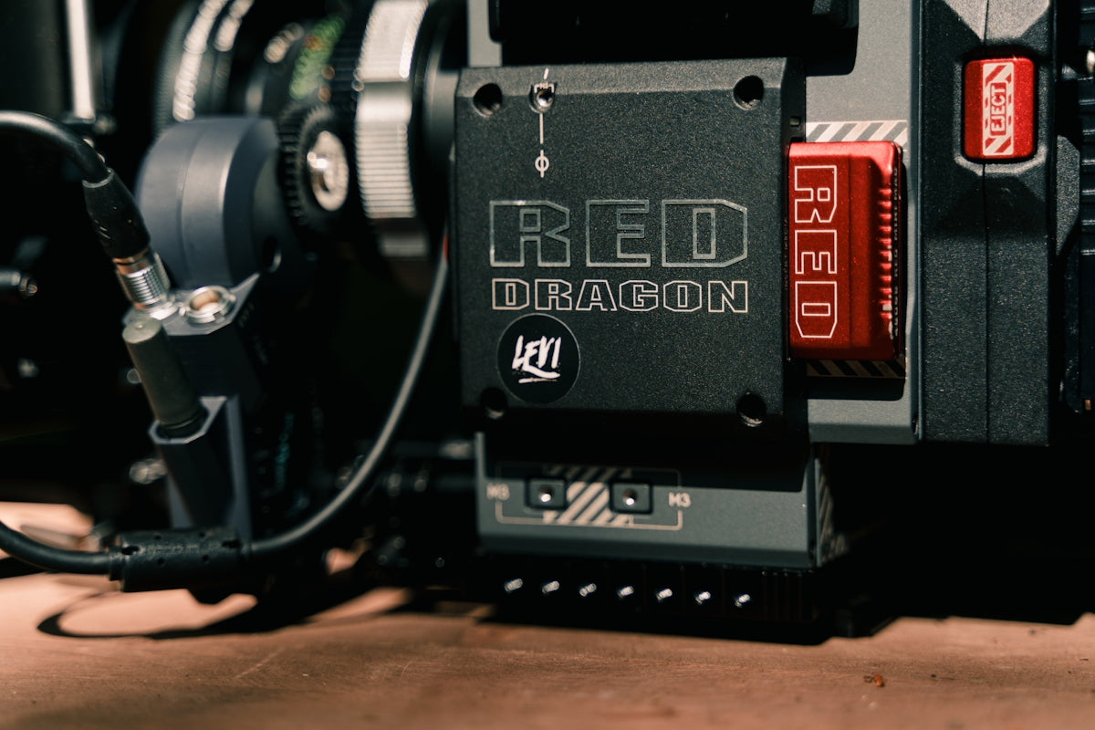 a close up of a red dragon camera