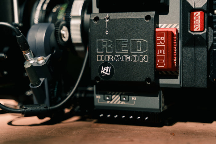 a close up of a red dragon camera