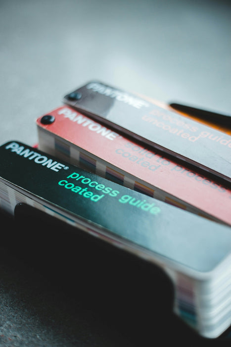 three credit cards sitting on top of each other