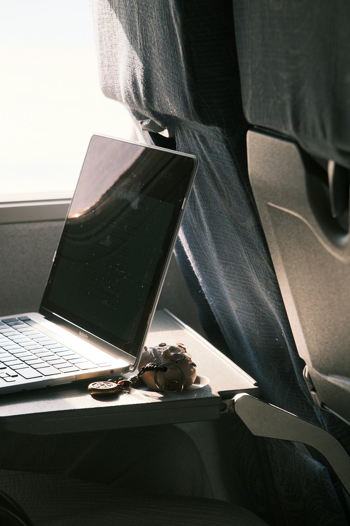 a laptop computer sitting on top of a desk