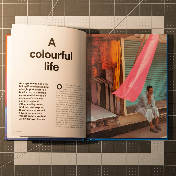 Open book with the words a colourful life.