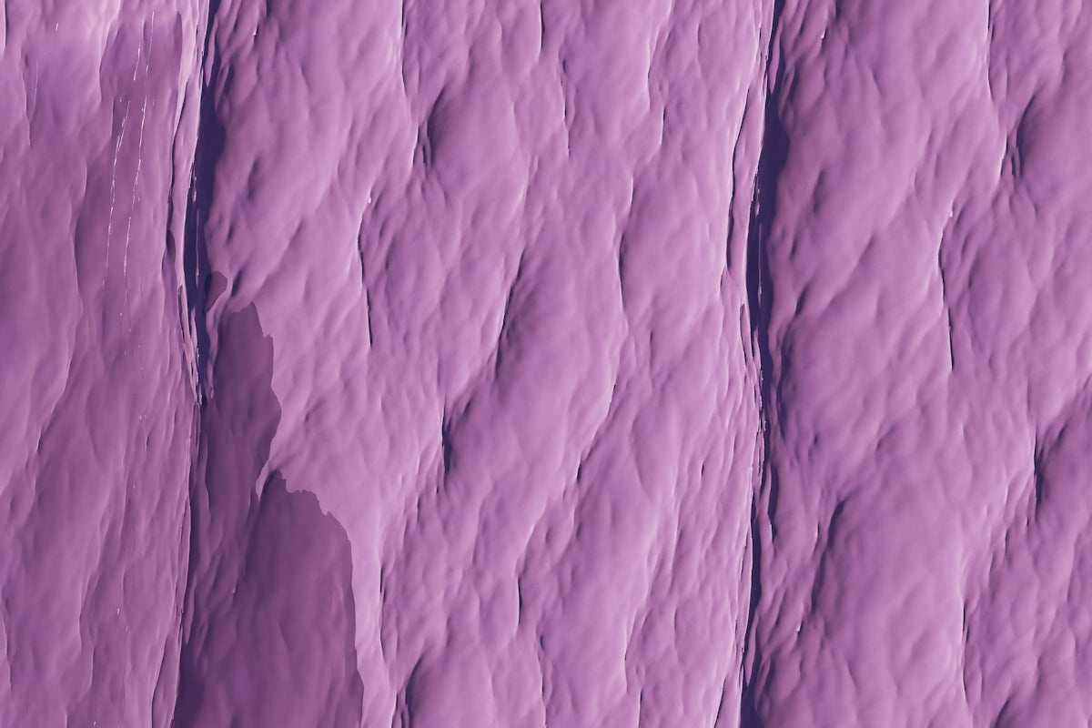 Textured purple surface with vertical ridges