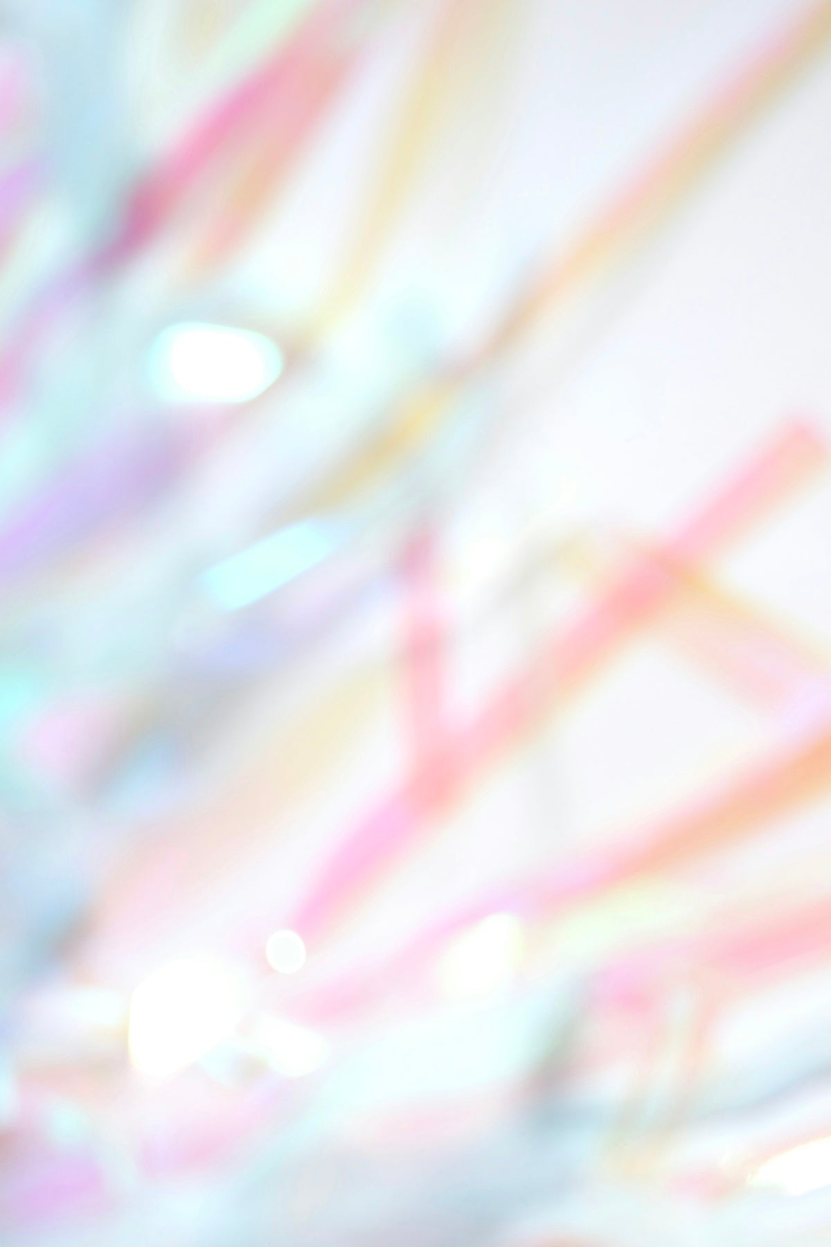 Soft pastel streamers with bokeh lights