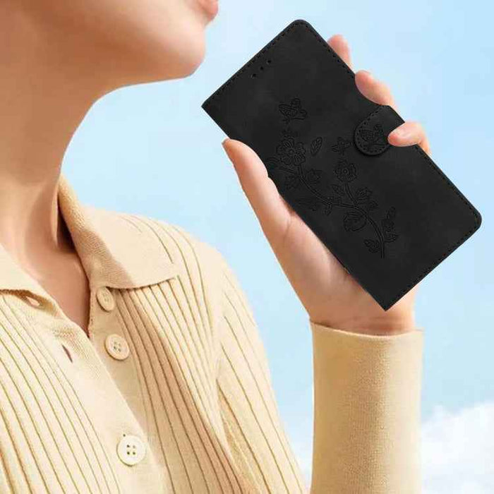 For iPhone 16 Plus Flower Butterfly Embossing Pattern Leather Phone Case(Black)