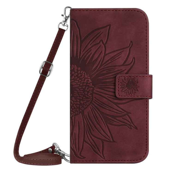 For iPhone 16 Plus Skin Feel Sun Flower Embossed Flip Leather Phone Case with Lanyard(Wine Red)