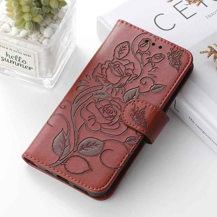 For iPhone 17 Pro Max Rose Butterfly Embossed Leather Phone Case(Brown)