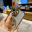 For iPhone 15 Gradient Glitter Spinning Top Holder Phone Case(Desert Gold)