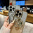 For iPhone 15 Gradient Glitter Spinning Top Holder Phone Case(Desert Gold)