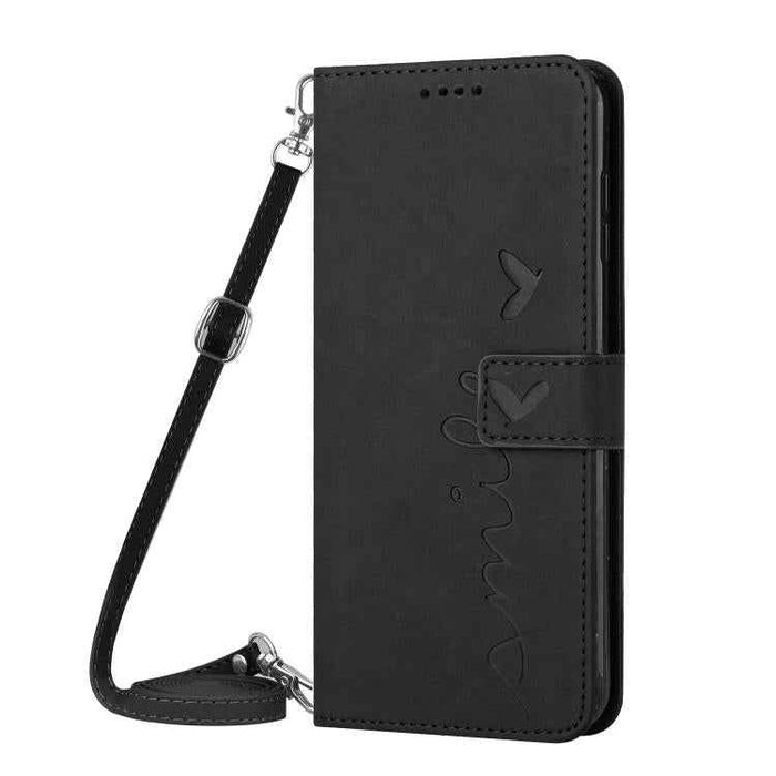For iPhone 17 Skin Feel Heart Embossed Leather Phone Case with Long Lanyard(Black)