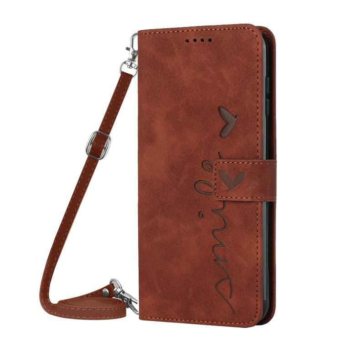 For iPhone 17 Skin Feel Heart Embossed Leather Phone Case with Long Lanyard(Brown)