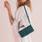 For iPhone 17 Air Skin Feel Heart Embossed Leather Phone Case with Long Lanyard(Green)