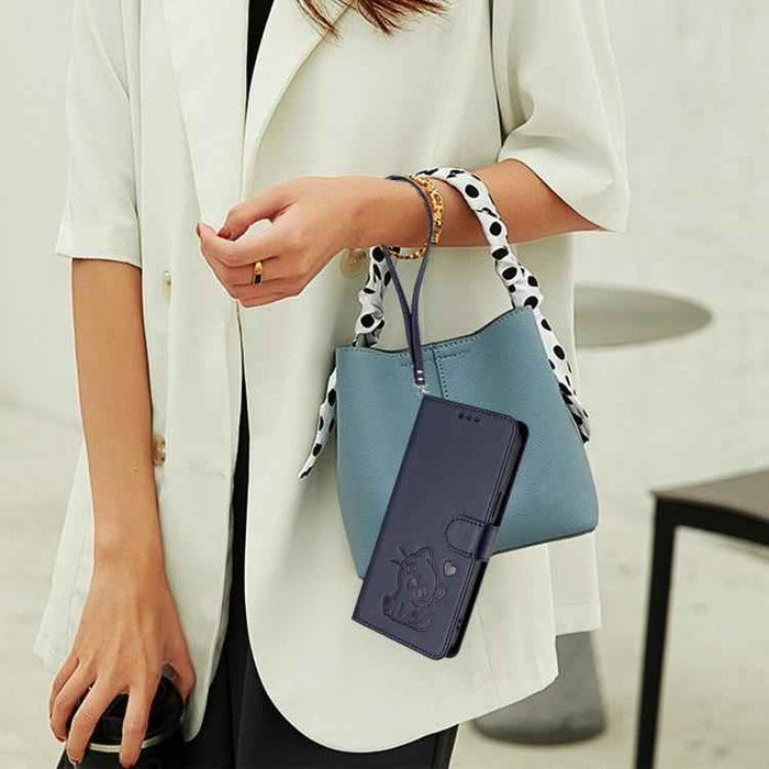 For iPhone 17 Pro Embossed Heart Cat Leather Phone Case with Hand Strap(Blue)