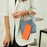 For Samsung Galaxy S25 FE 5G Embossed Heart Cat Leather Phone Case with Hand Strap(Orange)