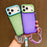 For iPhone 17 Pro Max Color Contrast Lens Frame Transparent TPU Phone Case with Lanyard(Purple+Green)