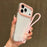 For iPhone 17 Pro Color Contrast Lens Frame Transparent TPU Phone Case with Lanyard(Transparent+Light Pink)